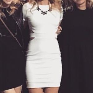 White bodycon dress with side cut outs